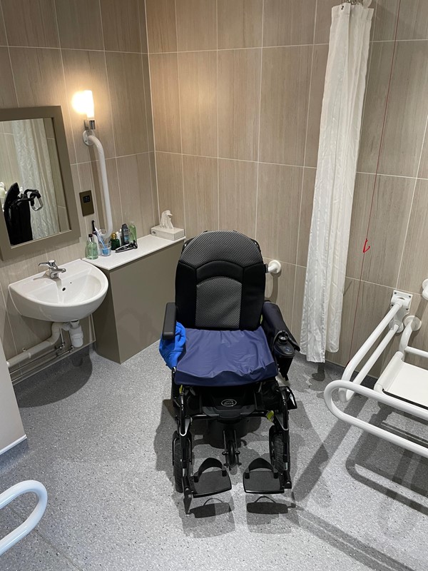 A roomy bathroom, although the sink was a bit low to get the wheelchair under it