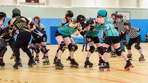 Blockers stopping the jammers getting through.

Photo courtesy of Mark Harris Photography (thanks Mark!)