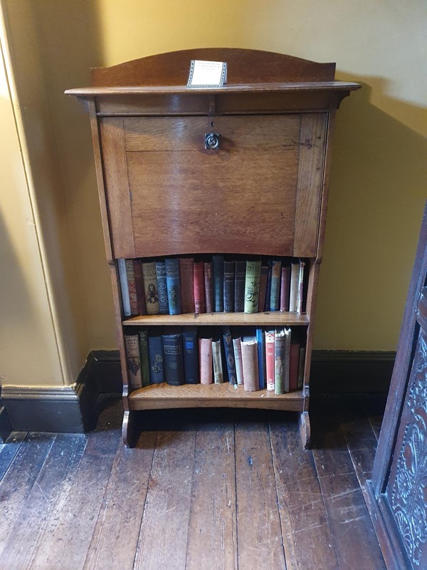 arts and crafts bookcase in schoolroom