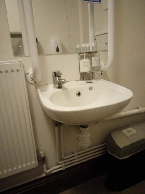 Picture of the sink in the accessible toilet