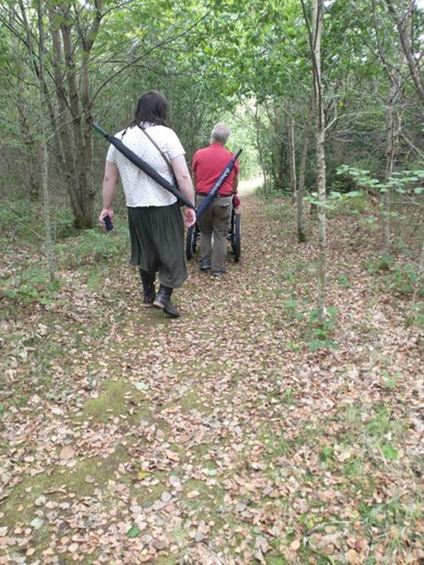 People going through the woods