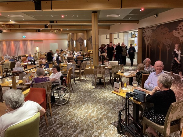 Image of people in a dining area