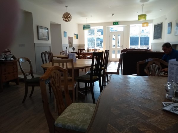 Spacious cafe with view towards front level entrance