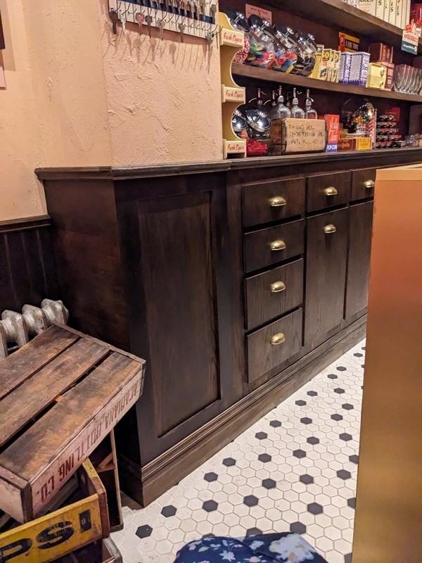 This bar is too narrow and has props blocking the entrance, I can't get behind it to explore the different elements or get a fun photo.