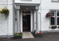 The entrance with a small ramp