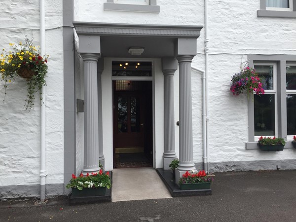 The entrance with a small ramp