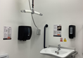 Height adjustable changing bed as well as hoist.