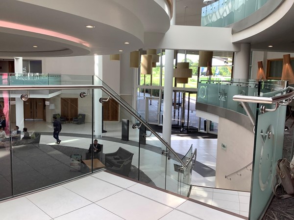 Picture of stairs going down to a lobby
