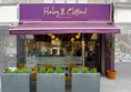 Exterior of Haley and Clifford; one small step to get in but they have a ramp available for access. Outside seating available too