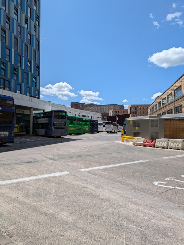 Image of buses parked at stances