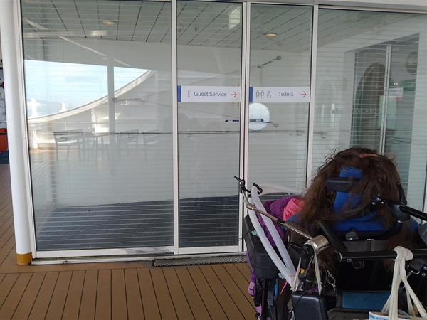 Image of guest services and toilet signs