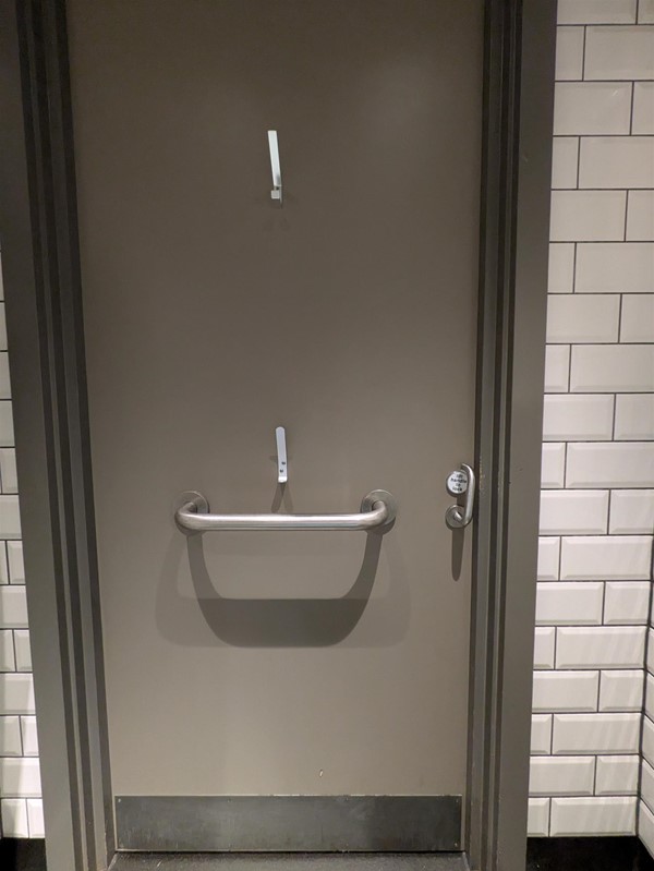Image of door to the accessible toilet fro the inside