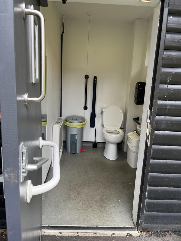 Image looking into the room containing an accessible toilet