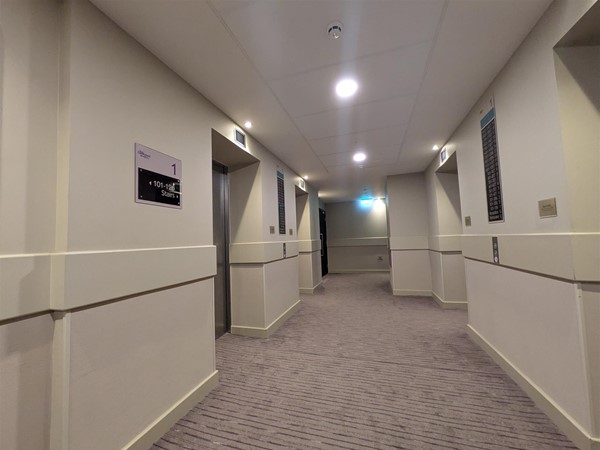 Image of corridor outside of the room