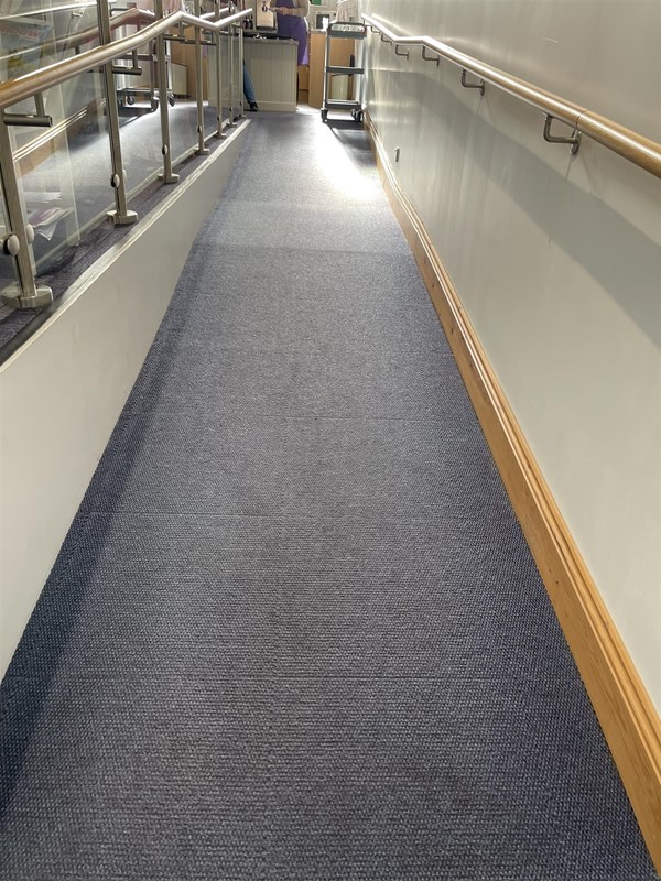 Image of a carpeted ramped area
