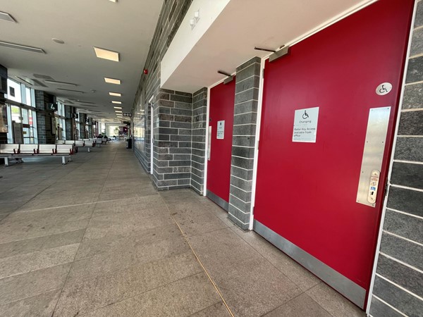 The main concourse at the Interchange in Galashiels and the door to the Changing Places toilet