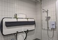 Image of adjustable change bed in the Changing Places toilet