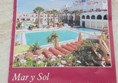 Front of Mar y Sol brochure with contact details