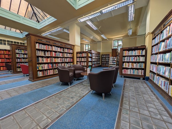 Image of book shelves and soft seats