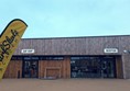 Image of surf shop and reception building