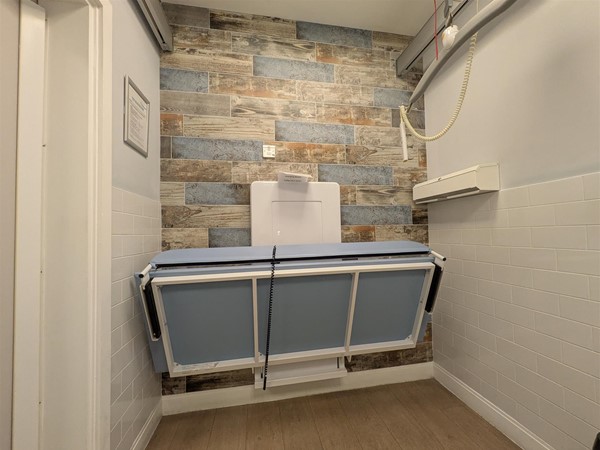 Image of Adjustable change bed in the Changing Places toilet