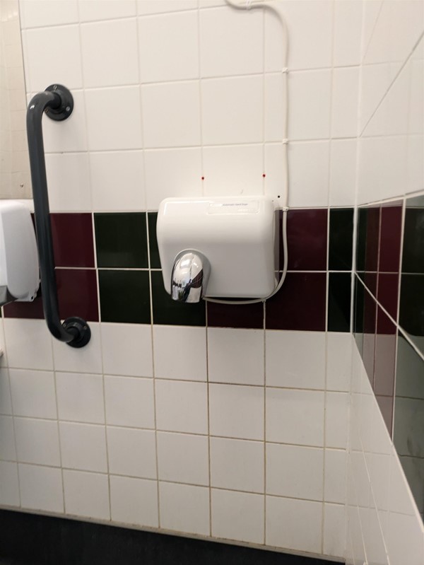 Image of hand dryer in the accessible toilet