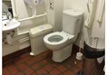 Toilet showing sink