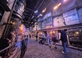 Image of an alley with shops