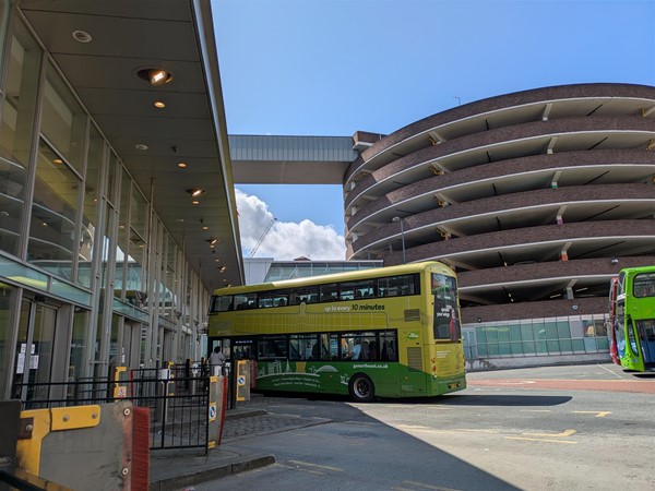 Image of a bus parked at a stance
