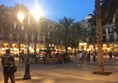Photo of the square at night.
