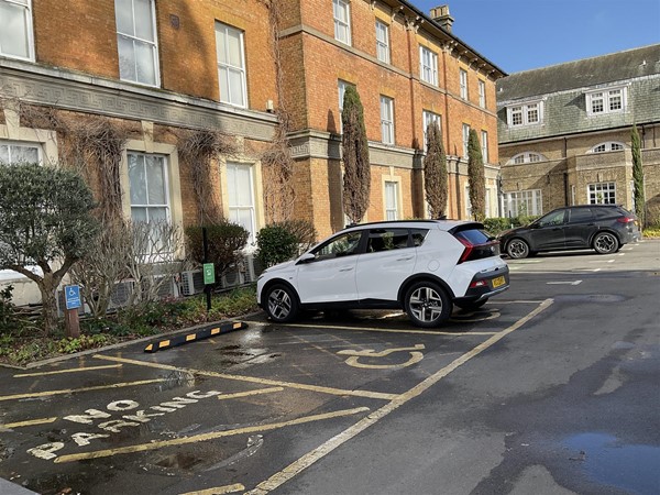Image of a car parked in a disabled parking space