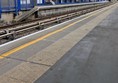 Image of tactile paving at the edge of the platform