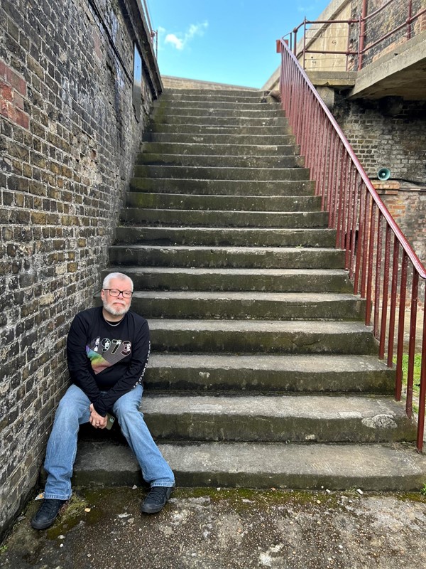 Sitting on stone stairs