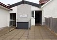 Entrance to toilets with ramp up to the door