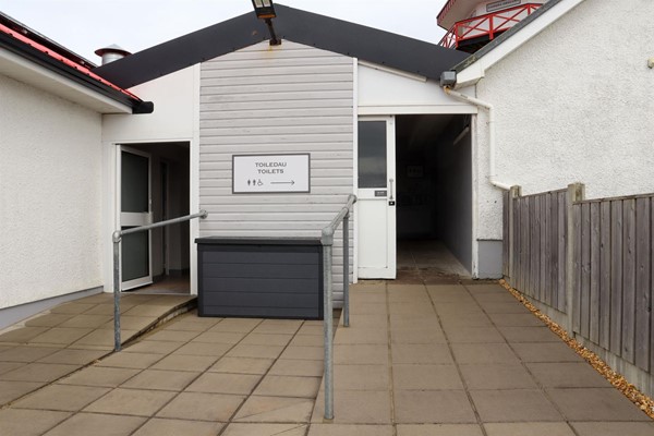 Entrance to toilets with ramp up to the door