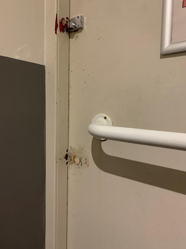 Height of lock and handrail on door