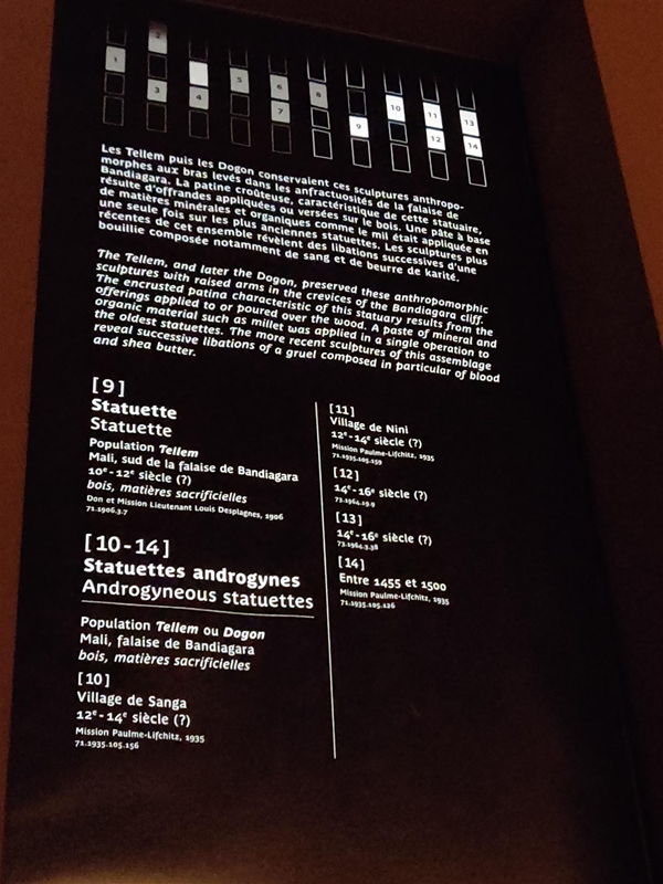 High up information panels with small hard to read writing, sometimes deformed