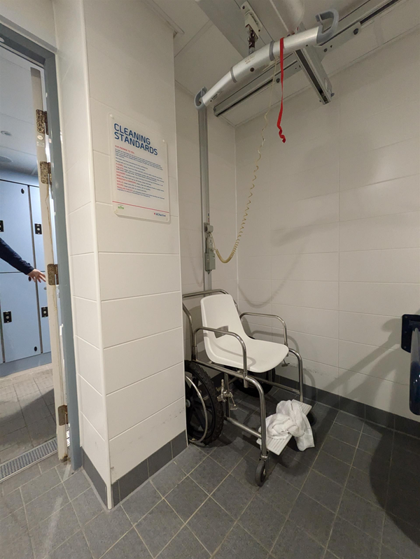 Image of the changing places ceiling track hoist and poolside wheelchair