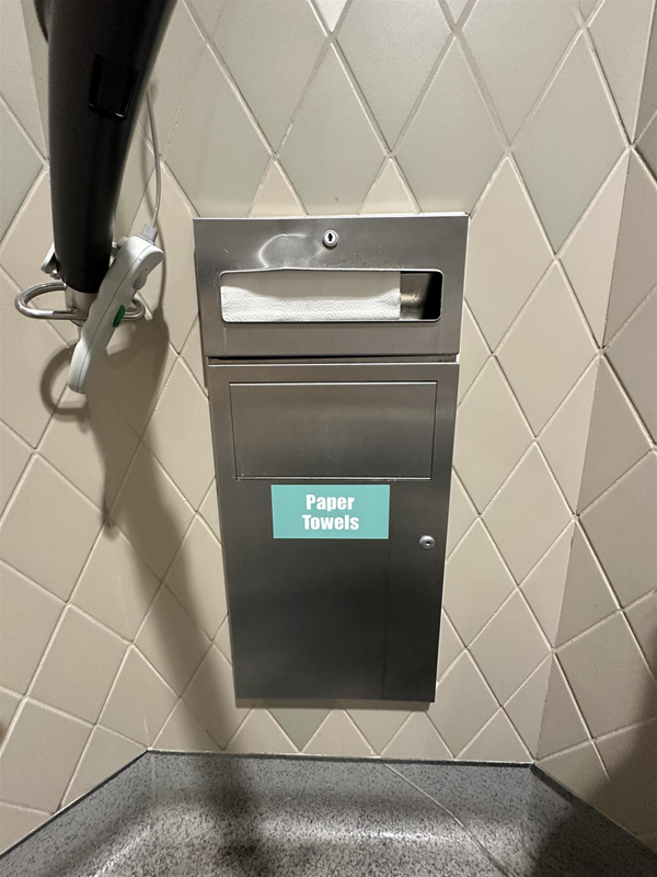 Image of wall-mounted paper towel dispenser