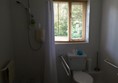 Ensuite shower and toilet. (Shower seat provided, non slip mat was ours.)