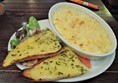 Macaroni cheese, garlic bread and salad