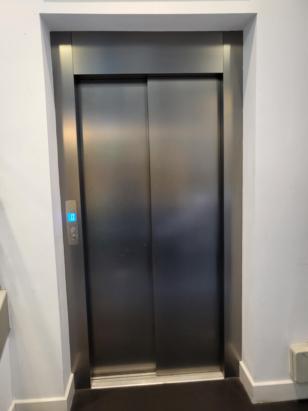 The lift leading from the gallery café to the ordering area and main seating area.