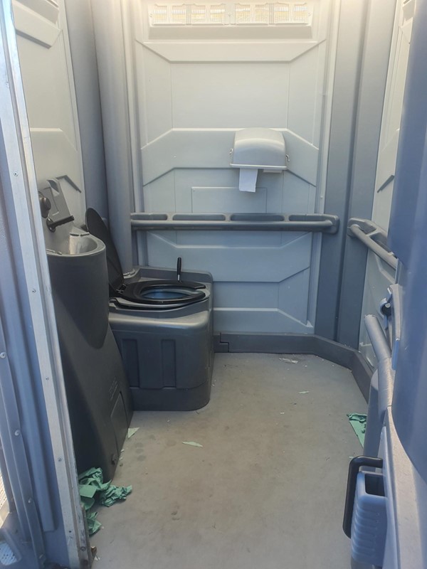 Image of the inside of the accessible porta loo.