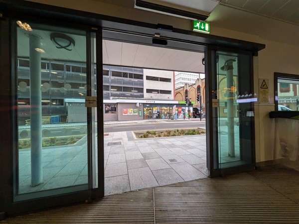 Image of entrance to the station with automatic doors