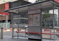 Image of covered bus shelter with perching benches
