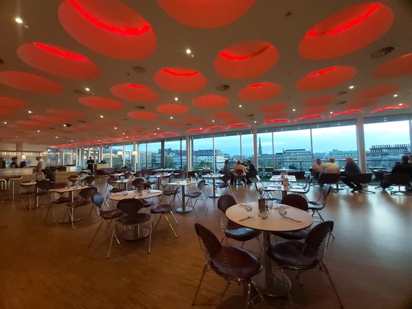 General view of restaurant looking towards the floor to ceiling picture windows