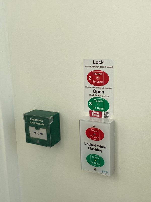 disabled toilet and baby changing door button