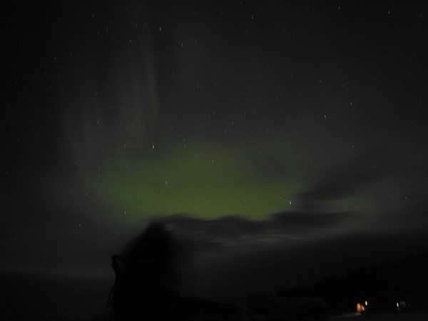 Us watching the aurora borealis you can just see our outline