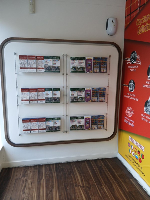 image of the flyer display on the left wall