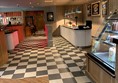 Picture of the pub floor and the toilet sign